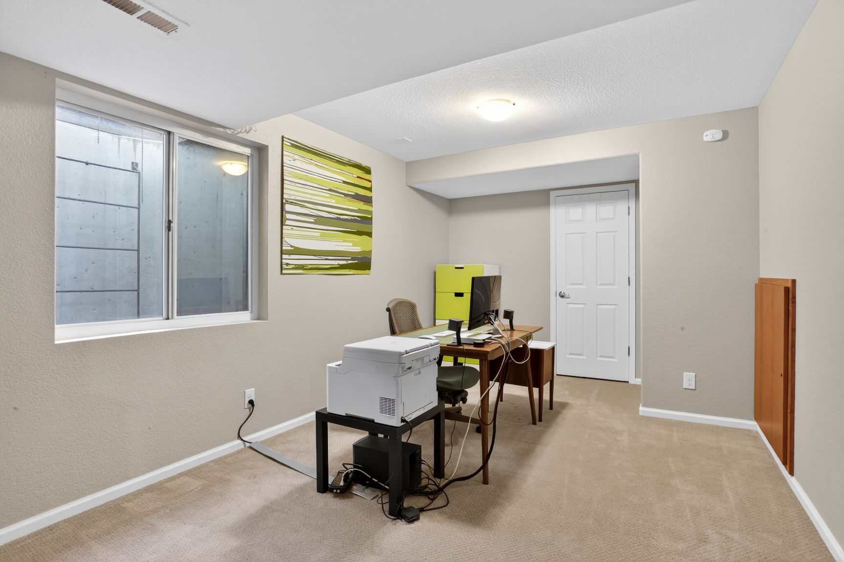 Lower-Level Bonus Room shown as photographed